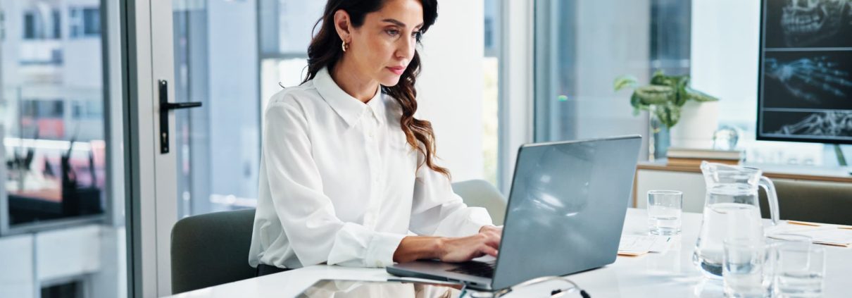 a woman working on a laptop