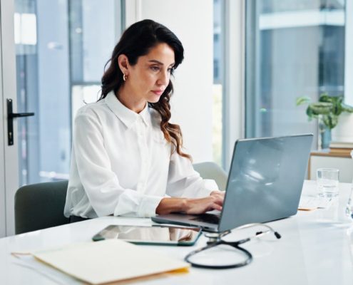 a woman working on a laptop