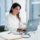 a woman working on a laptop